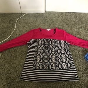 A pink Calvin klein shirt